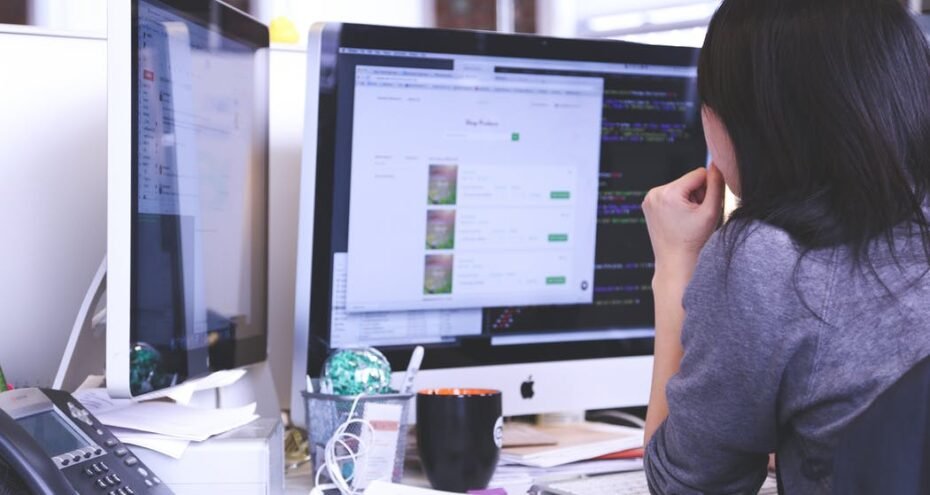 women looking at pc women looking at pc