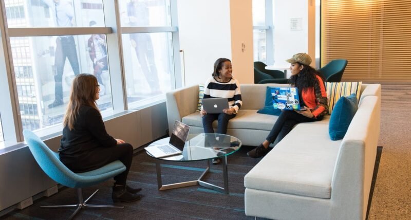 people looking at laptops people looking at laptops