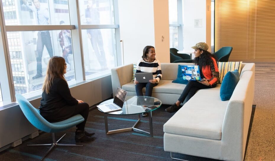 people looking at laptops